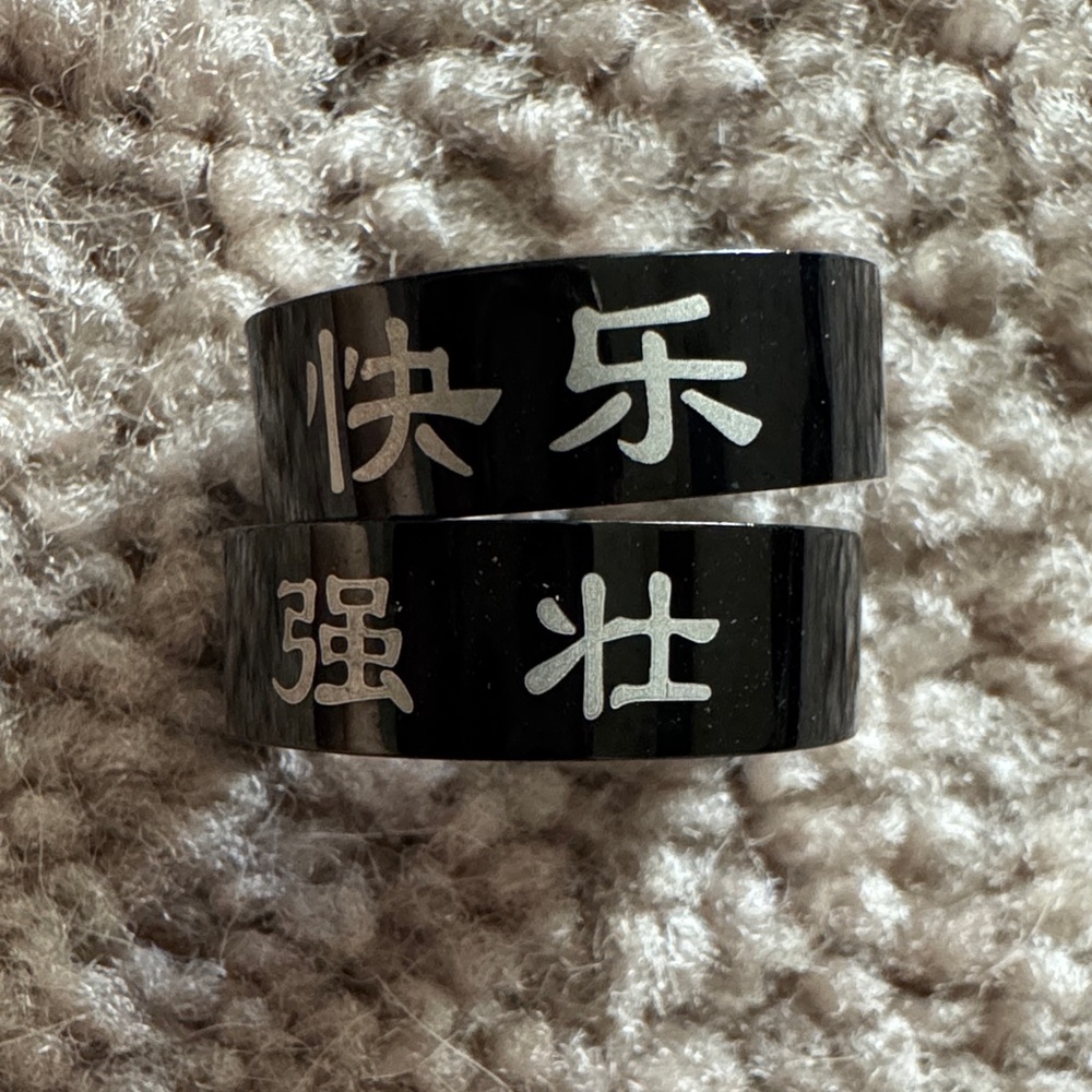 Black Ring Set with Silver Characters